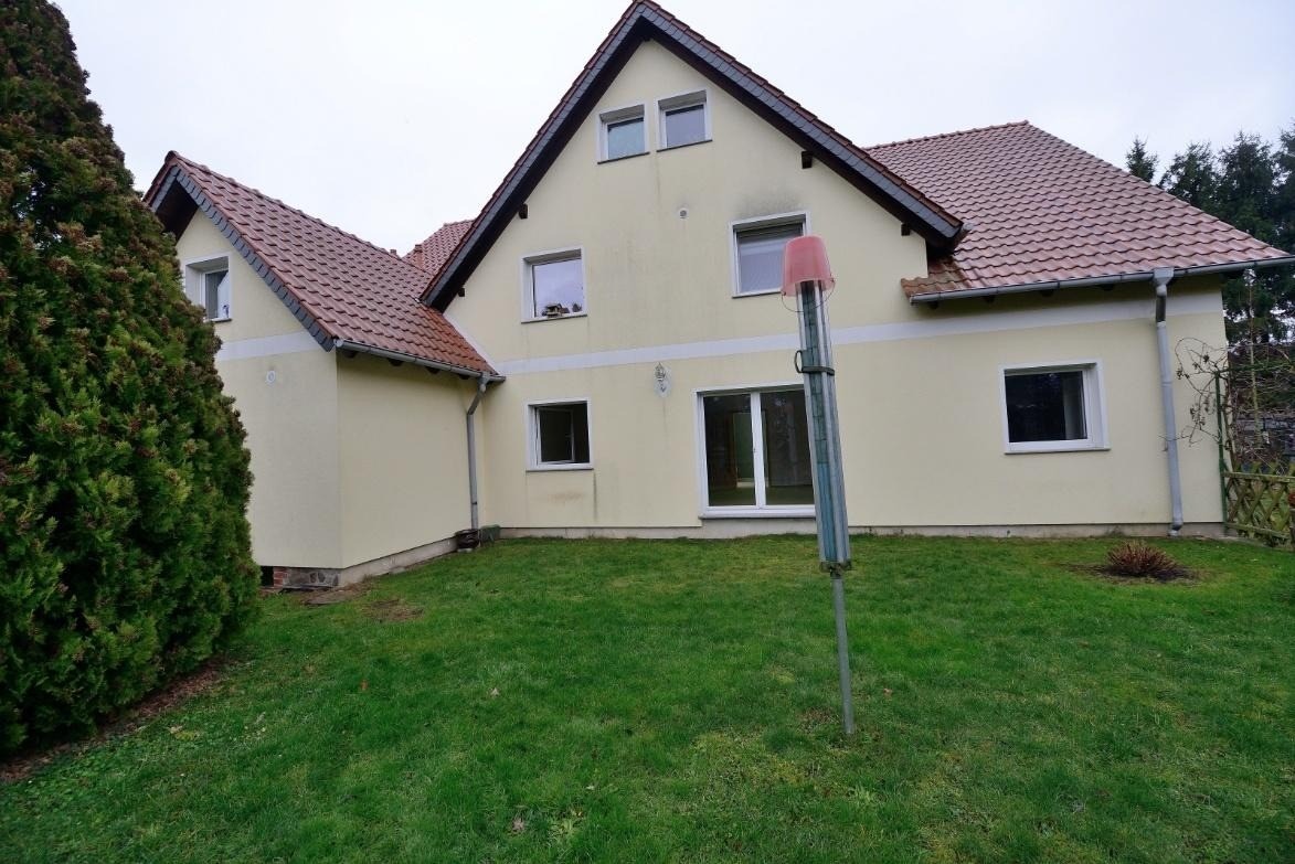 Zweifamilienhaus mit zusätzlichem Ausbauhaus, Garagen und Werkstatt in Grimma-Nerchau – Foto 1