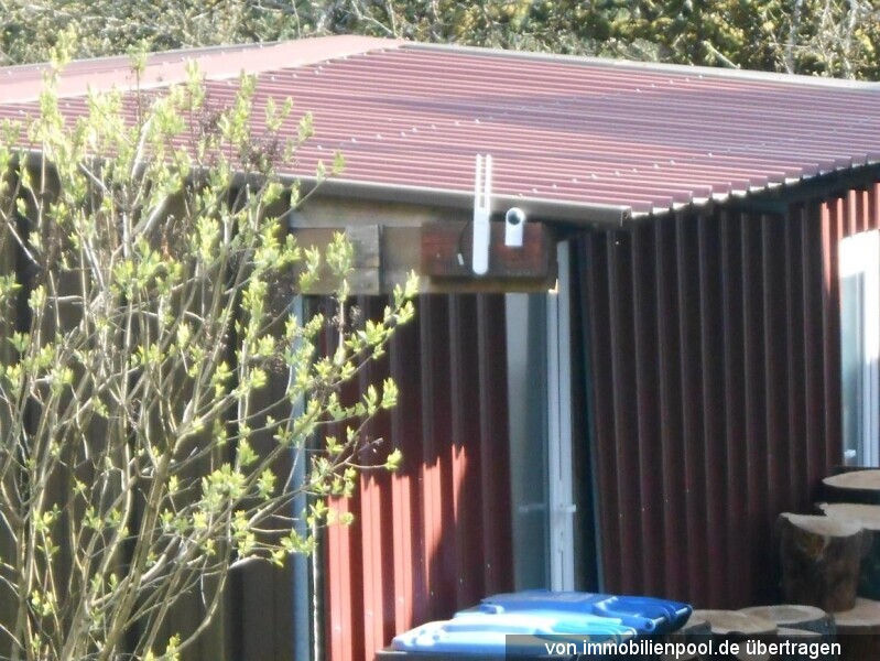Einfamilienhaus-Doppelhaushälfte mit Garage, Werkstatt und großem Grundstück in Bexbach-Höchen
