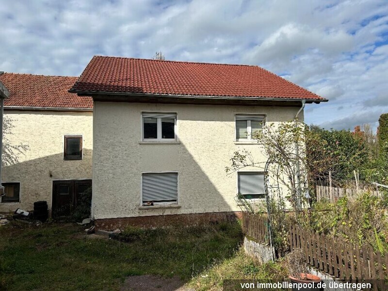 Einfamilienhaus mit Anbau und zwölf Flurstücken in Britten